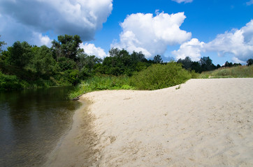 Sandy beach on a quiet river