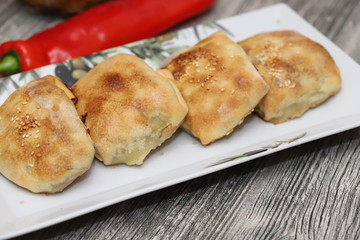 Meat patties, Central Asian cuisine on a plate.