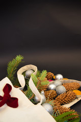 2020  New year Christmas frame with Christmas tree bag on a black background burgundy bow