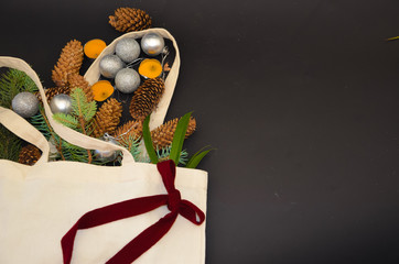 2020  New year Christmas frame with Christmas tree bag on a black background burgundy bow