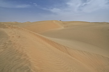 Fototapeta na wymiar Shifting sand dunes-Takla Makan Desert. Yutian Keriya county-Xinjiang Uyghur region-China-0319