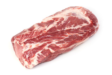 Fresh raw Pork neck meat, close-up, isolated on white background
