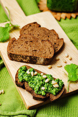 vegan cilantro pine nuts pesto on a wooden background