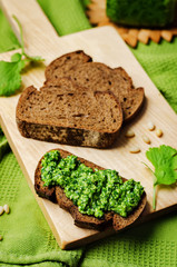 vegan cilantro pine nuts pesto on a wooden background