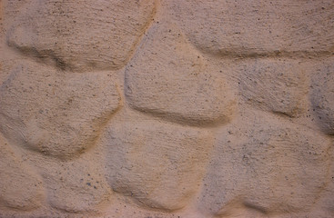 Decorative masonry painted in brown beige
