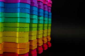 Rainbow stripes, steps with leaves, futurism abstraction on a black background