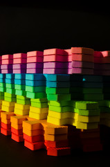 Rainbow stripes, steps with leaves, futurism abstraction on a black background