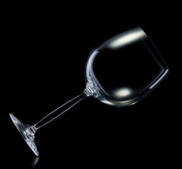 Empty glass for red wine isolated on black background.