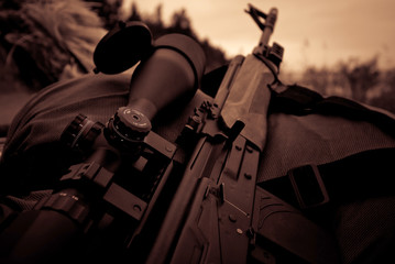 Automatic tactical sniper rifle with optical scope close-up, military ammunition