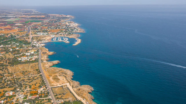 Aerial view of the beach lama monachile cala porto in the italian city polignano a mare. 
