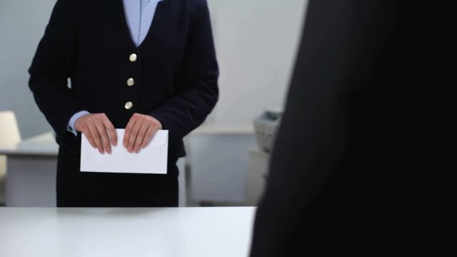 Company boss giving female manager envelope, black salary, illegal deal concept