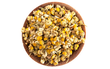 Bowl of Dried Chamomile Flowers Isolated on a White Background