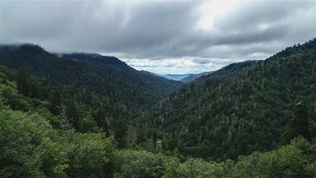 Cinemagraph view of mountains with moving clouds