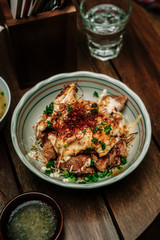 Chicken karaage, japanese fried chicken with cheese & chilli powder. From above, flat lay. Food photography concept