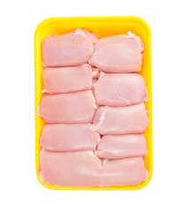 Raw chicken thigh meat without skin in tray. 