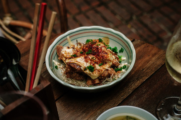 Chicken karaage, japanese fried chicken with cheese & chilli powder. Food photography concept