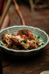 Chicken karaage, japanese fried chicken with cheese & chilli powder. Food photography concept