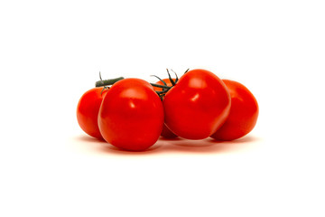 Tomatoes isolated on white. The concept of using tomatoes for dishes for sandwiches, vitamin C. Acquiring immunity, healthy lifestyle.
