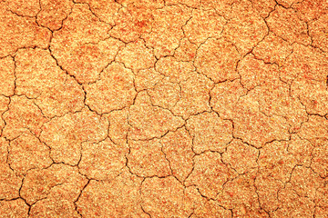 A cracked earth in Amazon with red/yellow tonish in Brazil