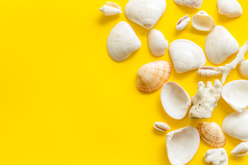 shells and seaside background for blog or desktop on yellow table top view mockup