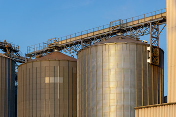 silos in field - industrial or farm building