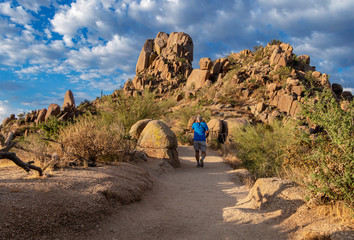 Man Hiking Up Desert Trail In Early Morning Near Scottsdale, AZ
