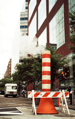 New York City streets. Factory pipe with smoke in New York City, Manhattan. 