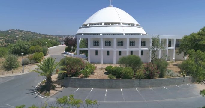 Aerial shot of Sanctuary of Nossa Senhora da Piedade (also known as Sanctuary of M&atilde;e Soberana), located in the municipality of Loul&eacute;, and attraction in Algarve destination region, Portugal.
