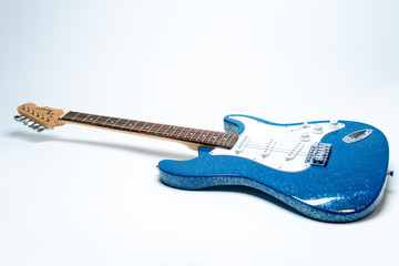 blue electric guitar at an angle