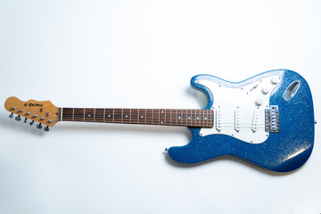 blue electric guitar straight on