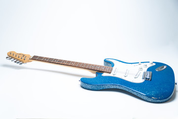 blue electric guitar left side