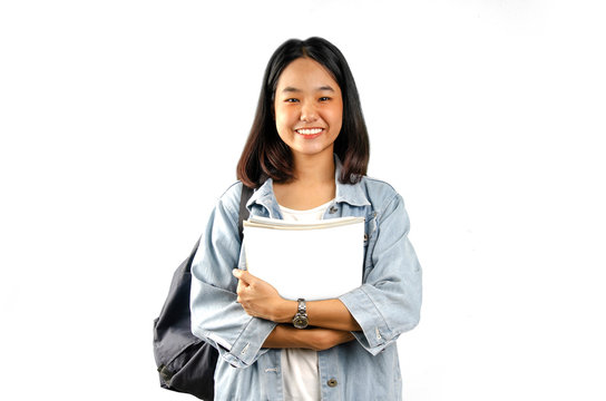 An Asian young student lady with the white background