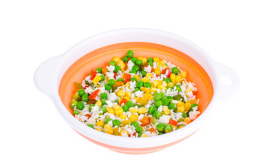 Fototapeta na wymiar Frozen vegetables with rice isolated on white background