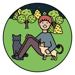 young man with cute cats mascots on the park