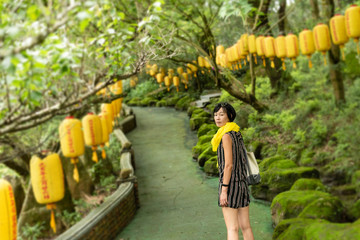 mature Asian woman stand at the path