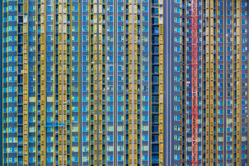Colorful windows of condominium under construction.
