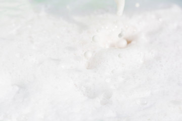 White foam made of soap.