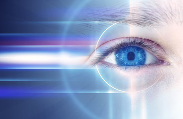 The eyes of a man on a bright abstract background with holograms