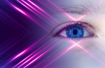 The eyes of a man on a bright abstract background with holograms