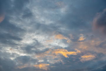 The cloudscape photo after the sunset with two tones of clouds in the evening after the rain. 