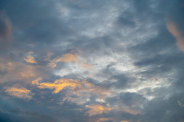 Fototapeta premium The cloudscape photo after the sunset with two tones of clouds in the evening after the rain. 