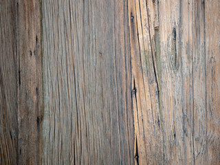 Close up details of old weathered wood background on an historic cabin in Goodsprings, Nevada, USA.