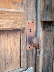 Details of the door knob and wood of the historic 1910 Cottonwood Cabin in Goodsprings, Nevada, USA.