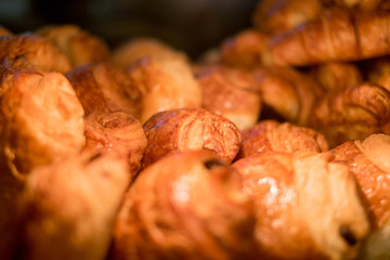 Croissants in the showcase at the bakery.