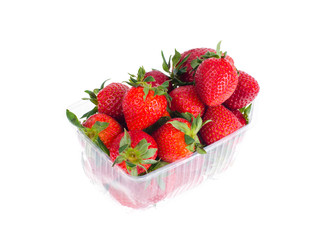 Fresh sweet red strawberries in plastic container. 