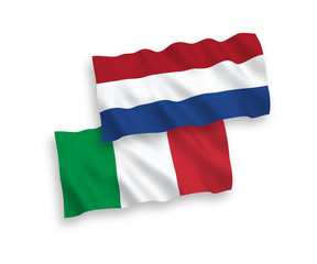National vector fabric wave flags of Italy and Netherlands isolated on white background. 1 to 2 proportion.