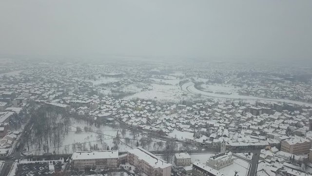 Aerial view of small town covered in snow