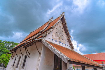 Fototapeta premium beautiful cups and bowls decorated on the wall of church at wat Ban Lang temple in Rayong province Thailand. the old church was built in Ayutthaya period