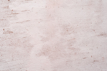 Texture of a concrete wall with cracks and scratches which can be used as a background