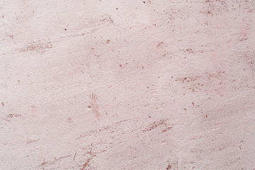 Texture of a concrete wall with cracks and scratches which can be used as a background
